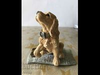 Puppy figurine with markings