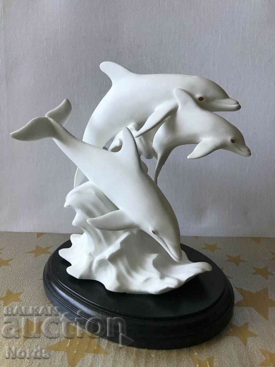 Beautiful figurine Dolphins