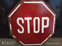 Enamel stop sign. Old road sign social stop