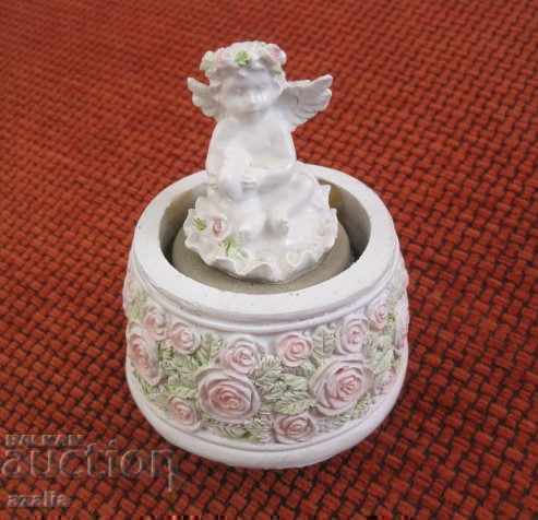 Angel figurine in a music box