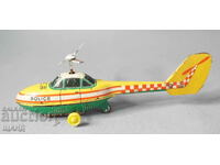 Old metal toy model helicopter police