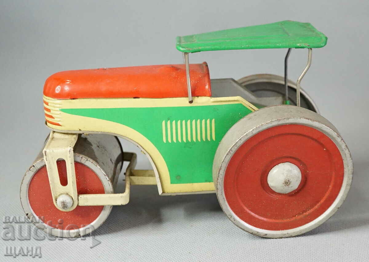 Old German metal mechanical toy roller model