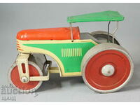 Old German metal mechanical toy roller model