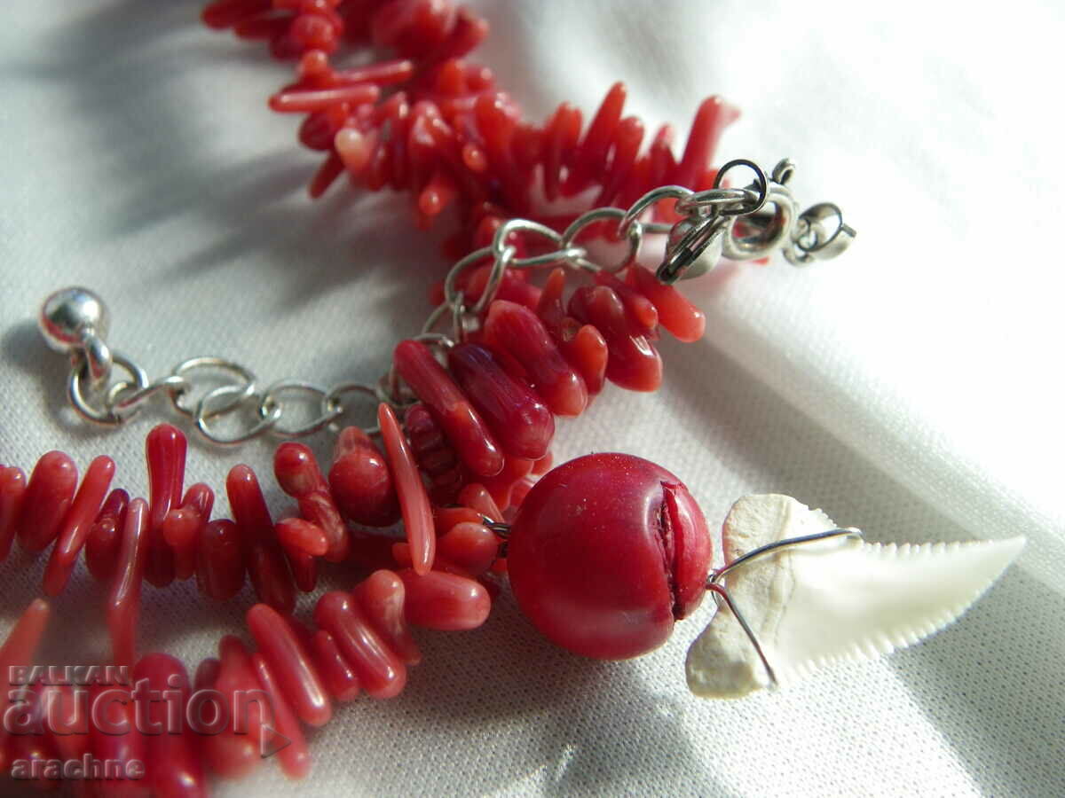 Delivery of Coral, shark tooth and silver necklace