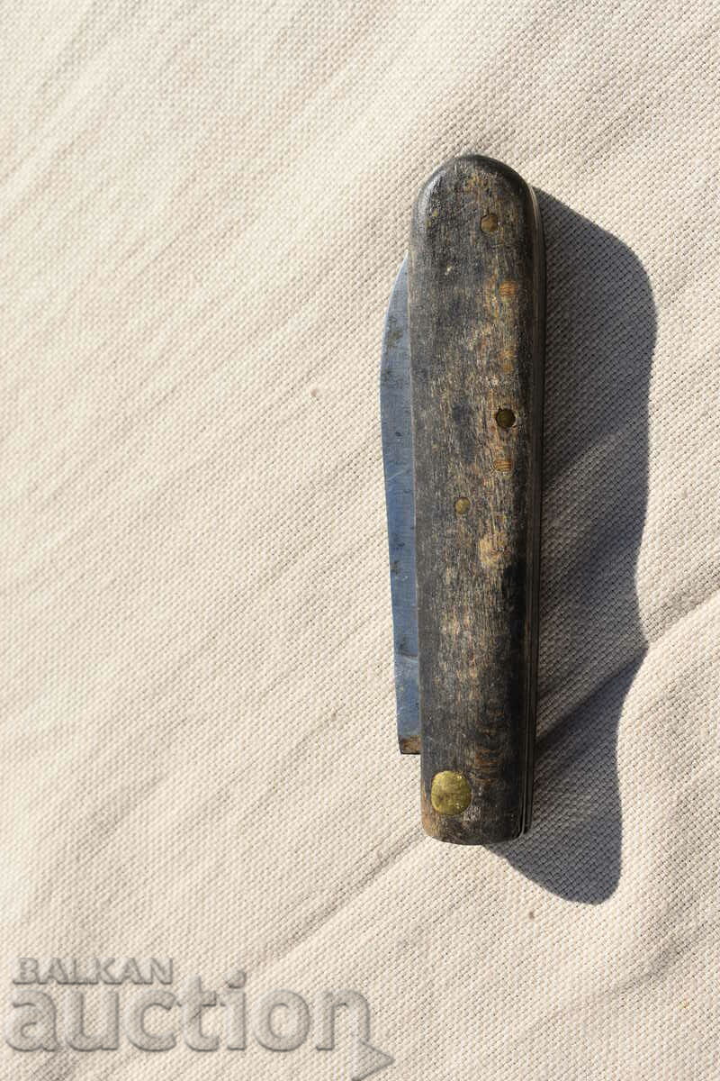 Delivery of Old hammer and sickle knife