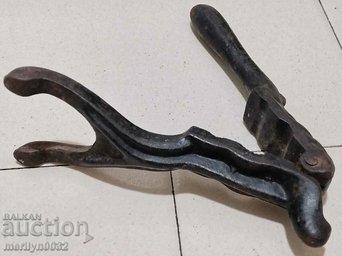 Auction Old relief cast iron nutcracker Auction Old relief cast iron nutcracker