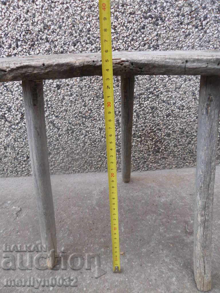 Delivery of Old three-legged stool, chair, wooden, primitive Delivery of Old three-legged stool, chair, wooden, primitive