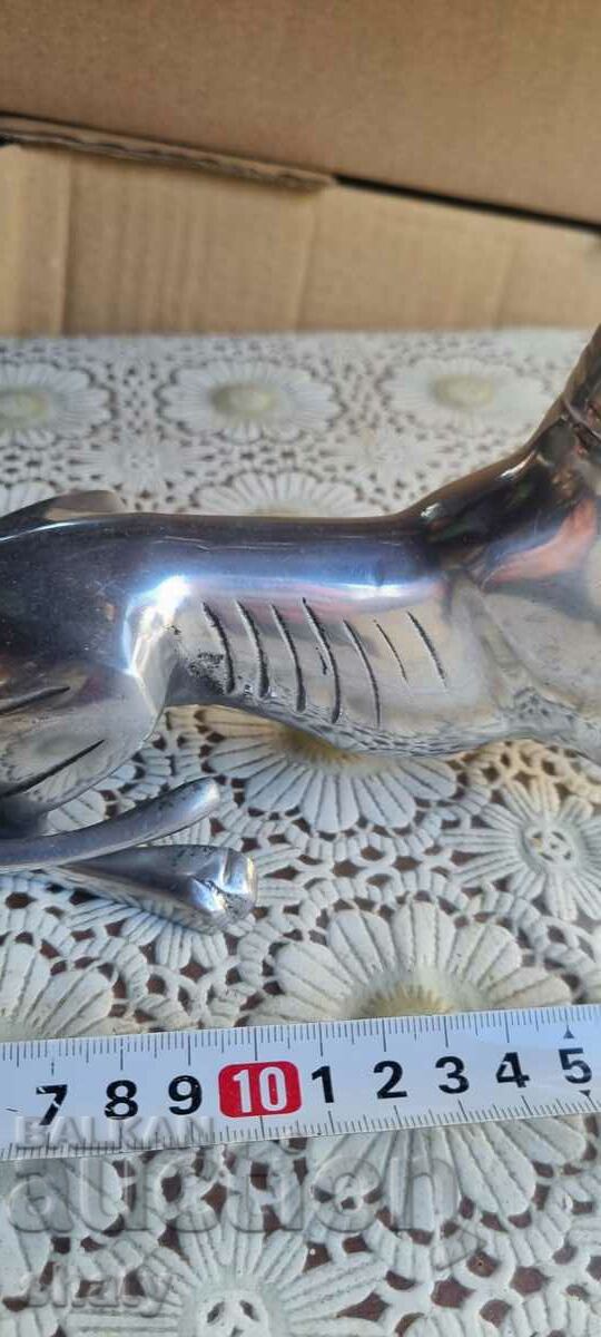 Delivery of Old figure Dog. Metal sculpture Delivery of Old figure Dog. Metal sculpture