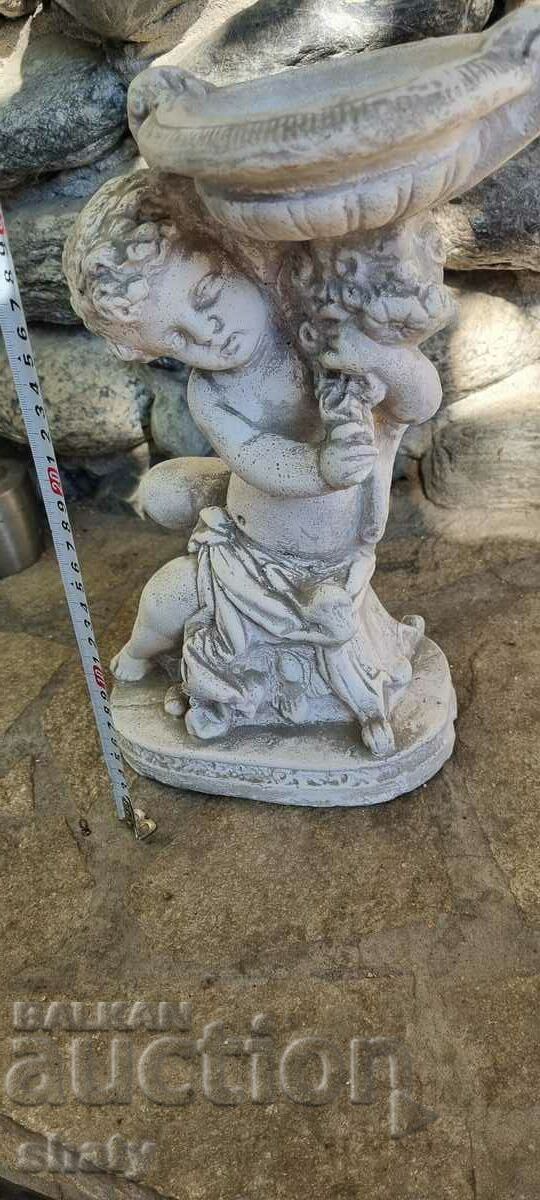 Old sculpture. Antique figure