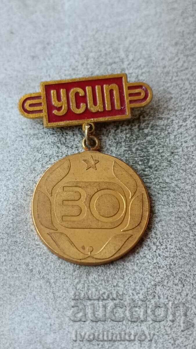 Badge 30 years Management Sports properties and events - gold