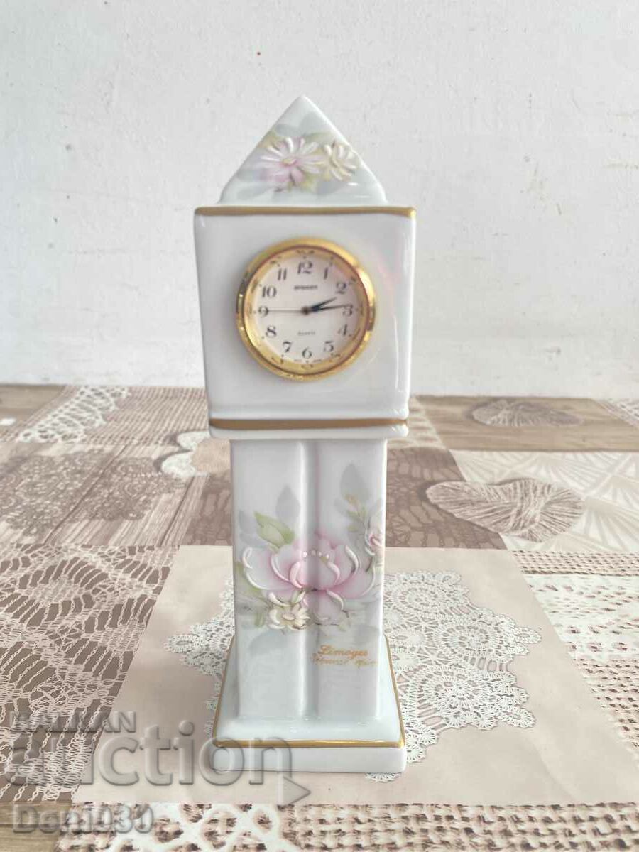 A beautiful porcelain quartz clock selection of Limoges