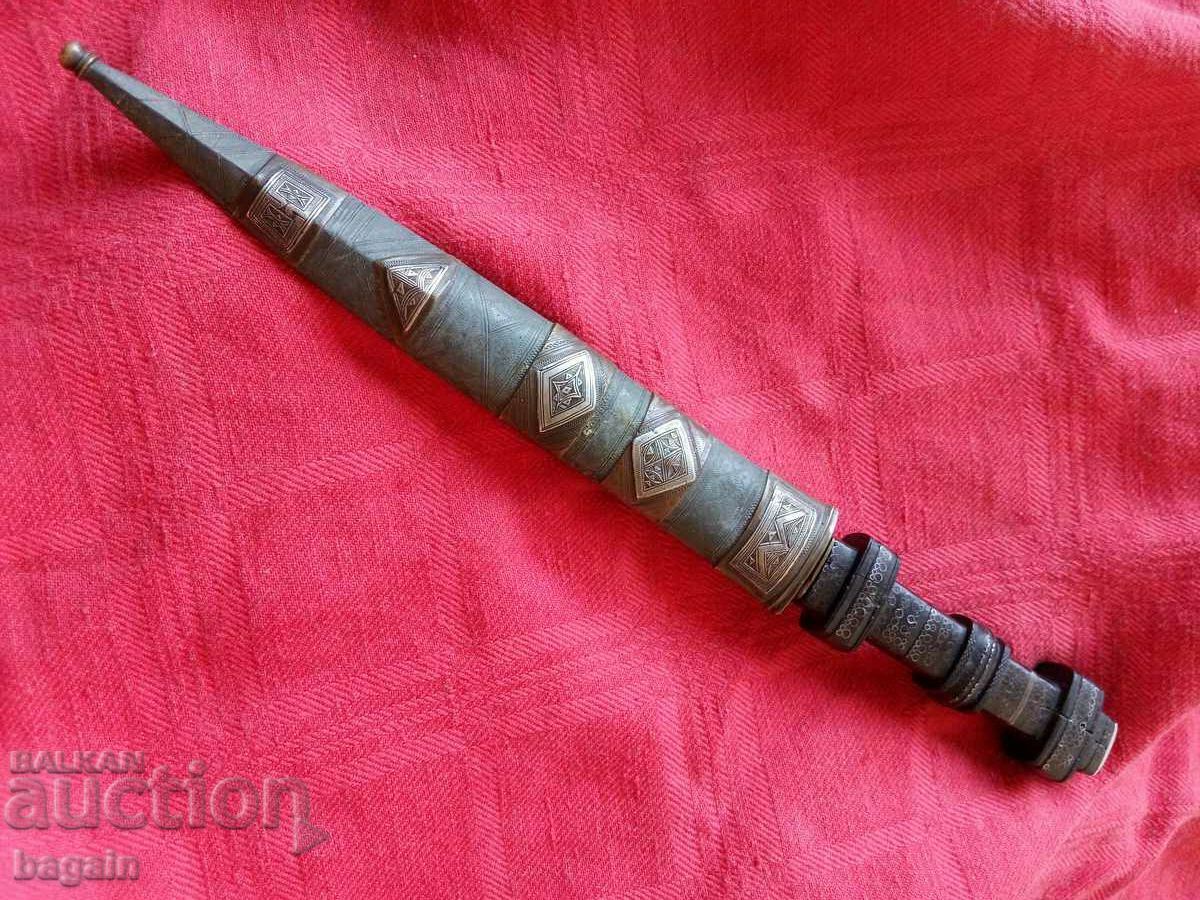 Dagger with silver inlay.