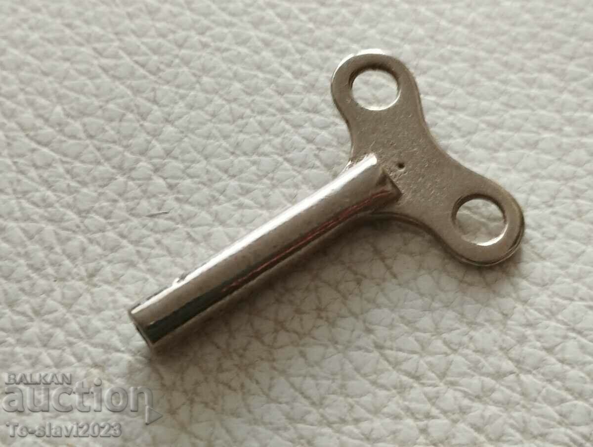 Old mechanical toy key -