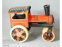 Old metal mechanical toy roller model