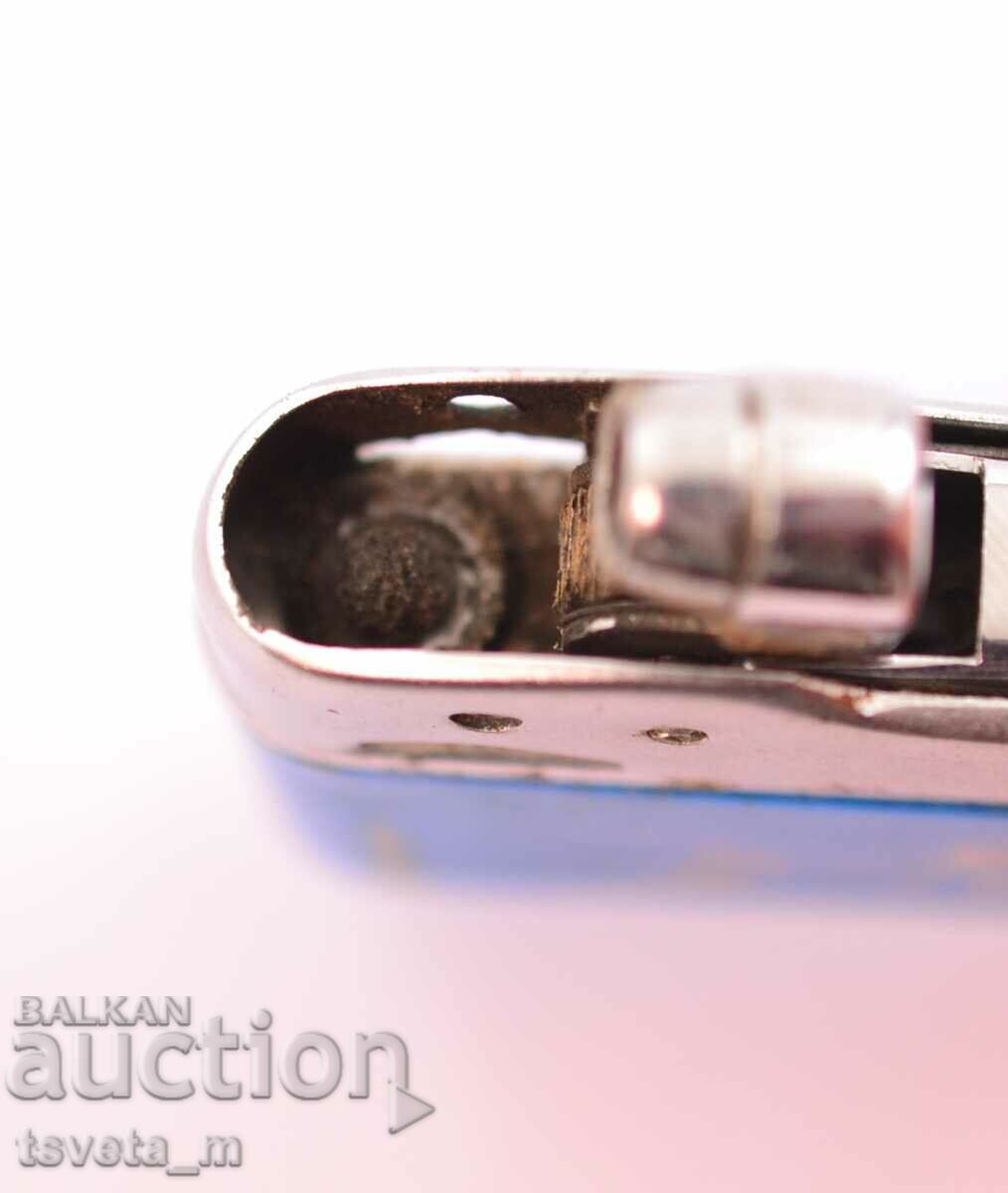 Auction Petrol lighter SUNFLOWER, made in China, 70s XX century Auction Petrol lighter SUNFLOWER, made in China, 70s XX century