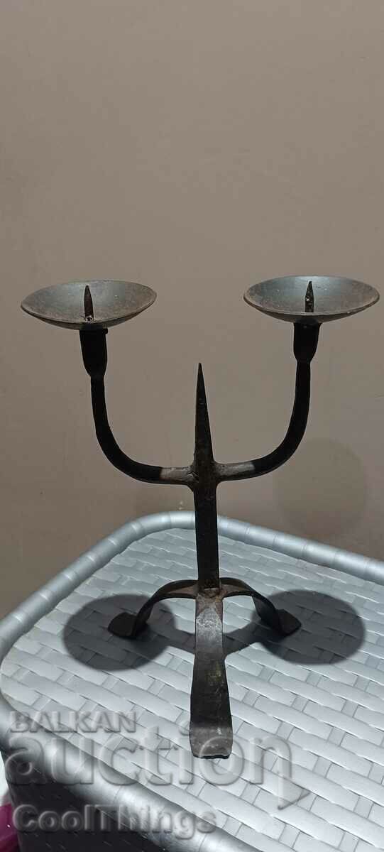 Old candlestick wrought iron vintage