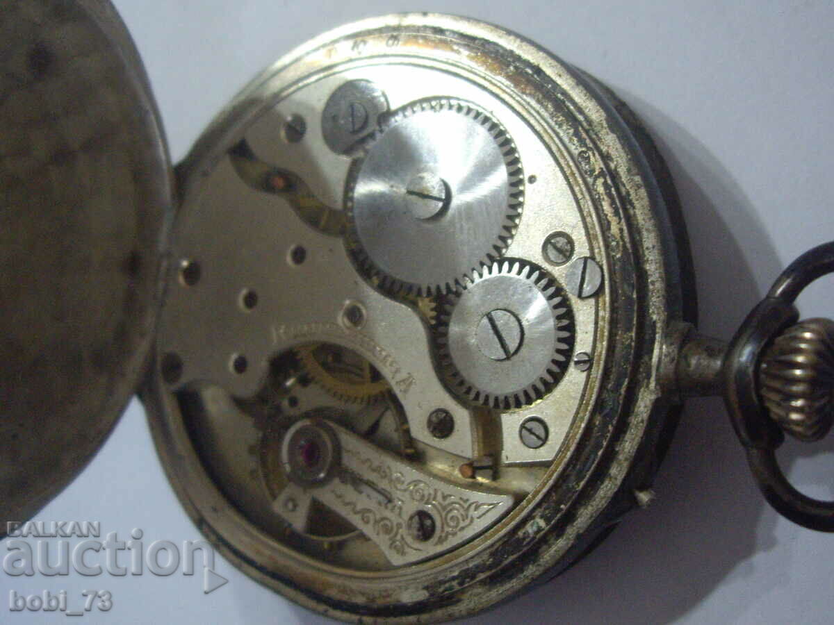 An old pocket watch. - 5 An old pocket watch. - 5
