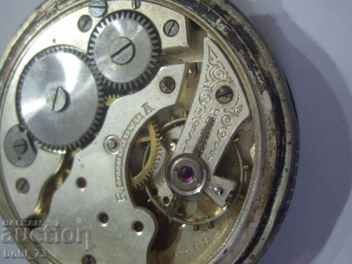 An old pocket watch. - 6 An old pocket watch. - 6