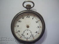 An old pocket watch.