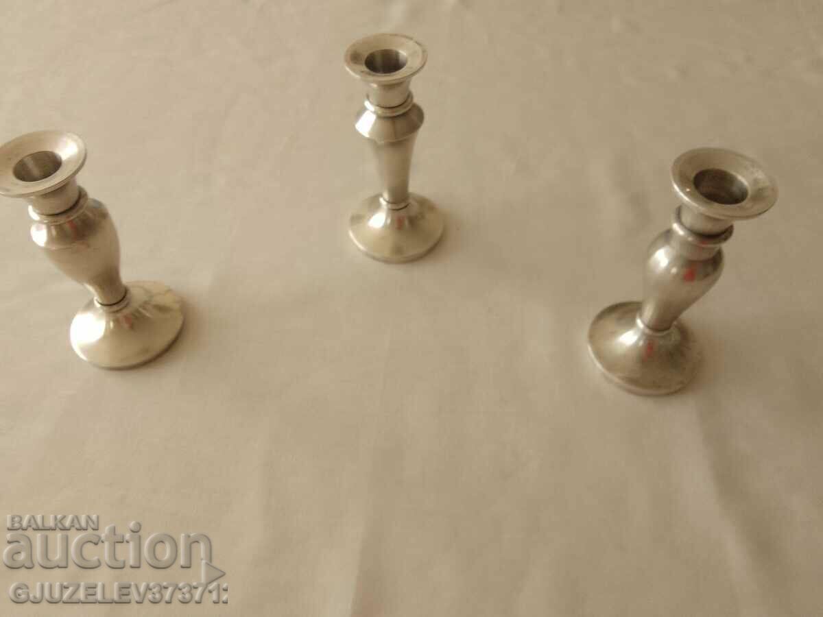 three silver-plated candlesticks for a restaurant large table with price 79.00 BGN | € 40.39 three silver-plated candlesticks for a restaurant large table with price 79.00 BGN | € 40.39