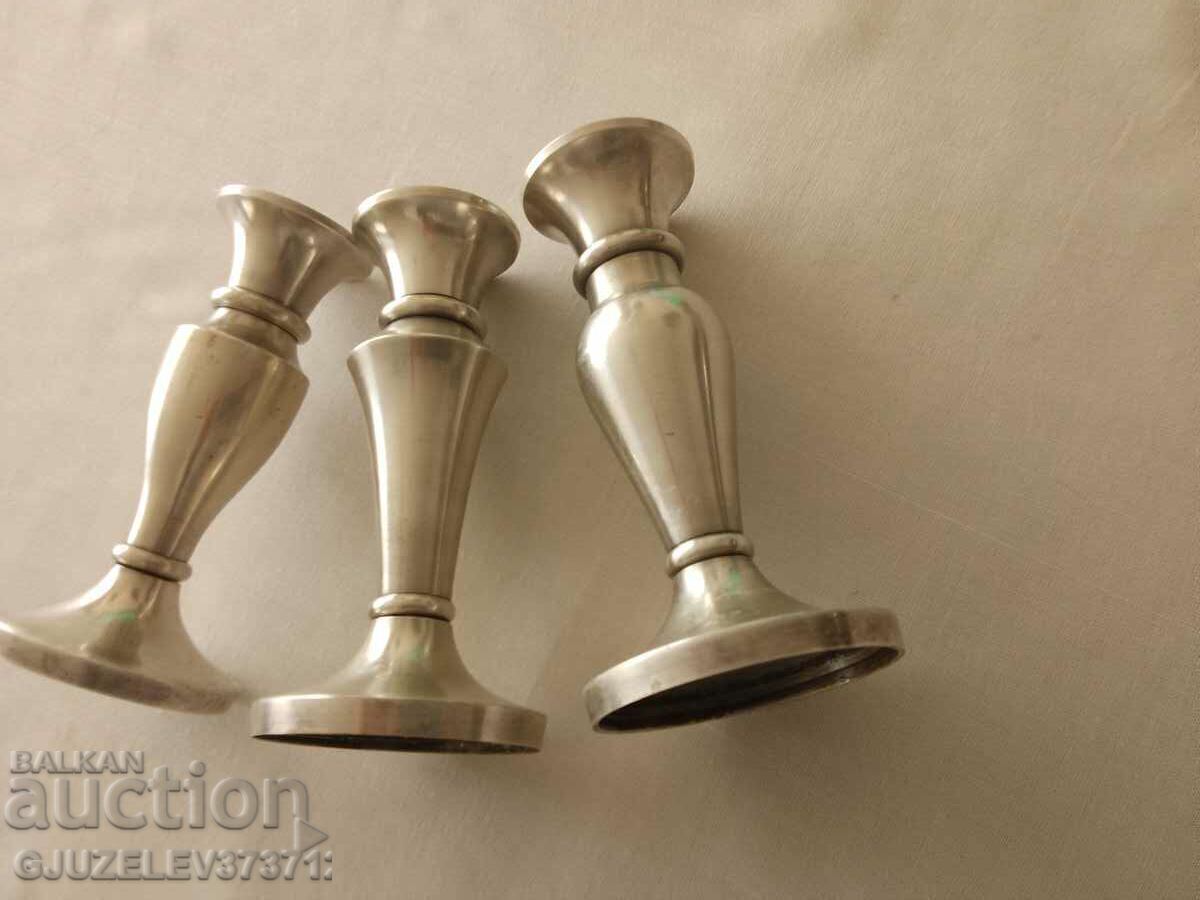 Auction three silver-plated candlesticks for a restaurant large table Auction three silver-plated candlesticks for a restaurant large table