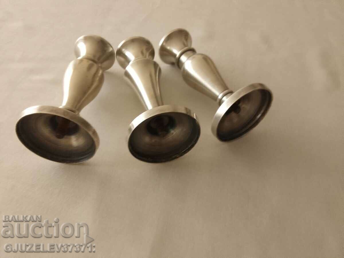 Delivery of three silver-plated candlesticks for a restaurant large table Delivery of three silver-plated candlesticks for a restaurant large table