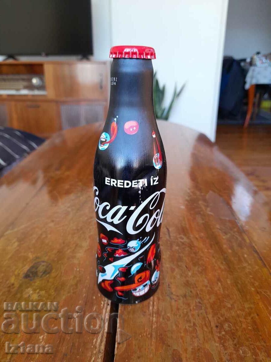 O sticlă veche de Coca Cola, Coca Cola