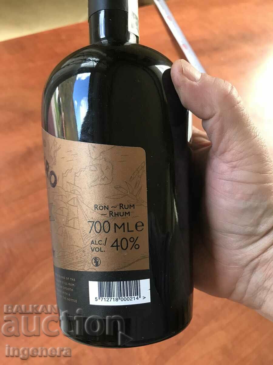 Auction  RUM GLASS BOTTLE BOTTLE