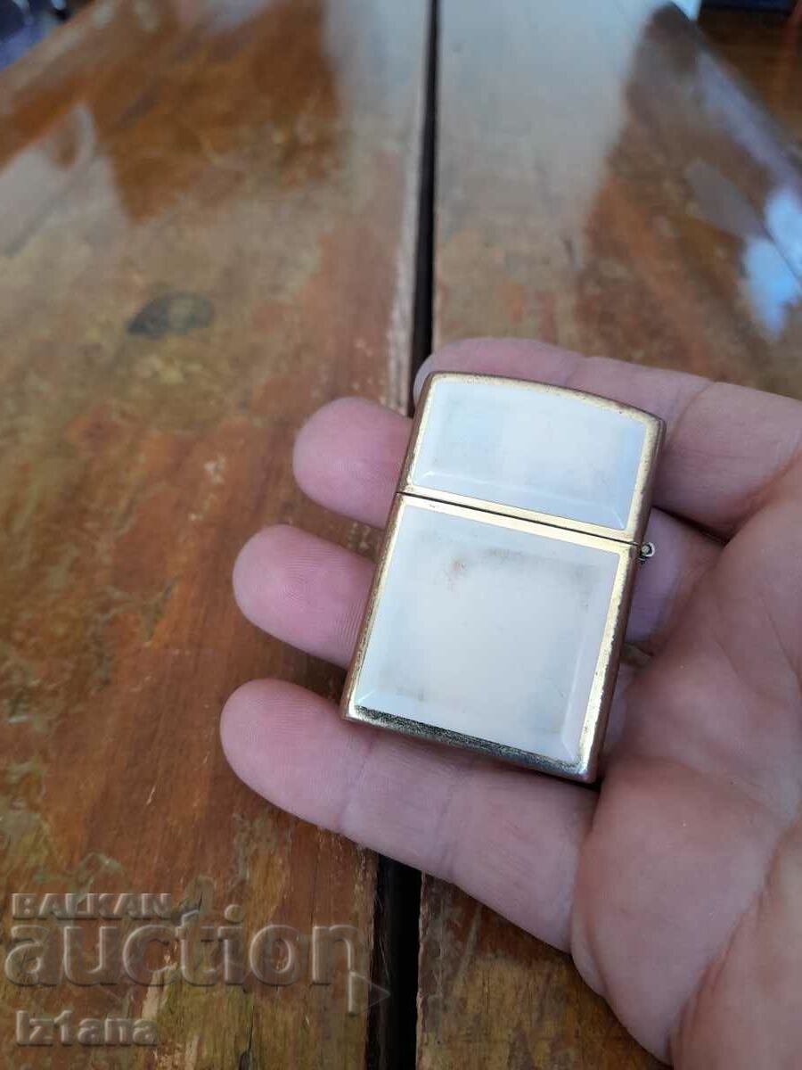Old Zippo Marlboro lighter with price 75.00 BGN | € 38.35 Old Zippo Marlboro lighter with price 75.00 BGN | € 38.35