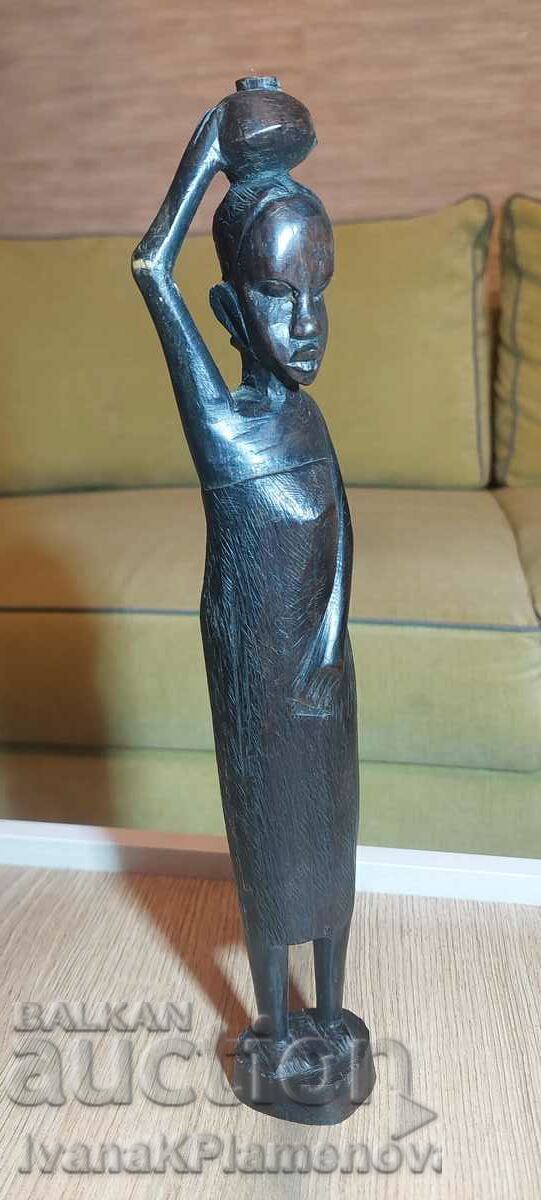 Wood carving Africa massif height 32 cm Wood carving Africa massif height 32 cm