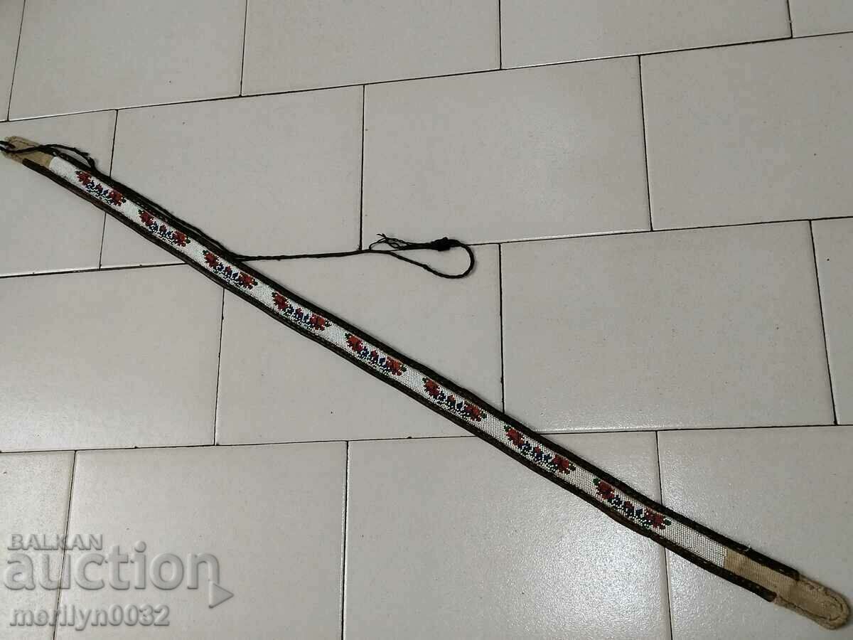 Auction Beaded belt, beaded cuffs, early 20th century Auction Beaded belt, beaded cuffs, early 20th century