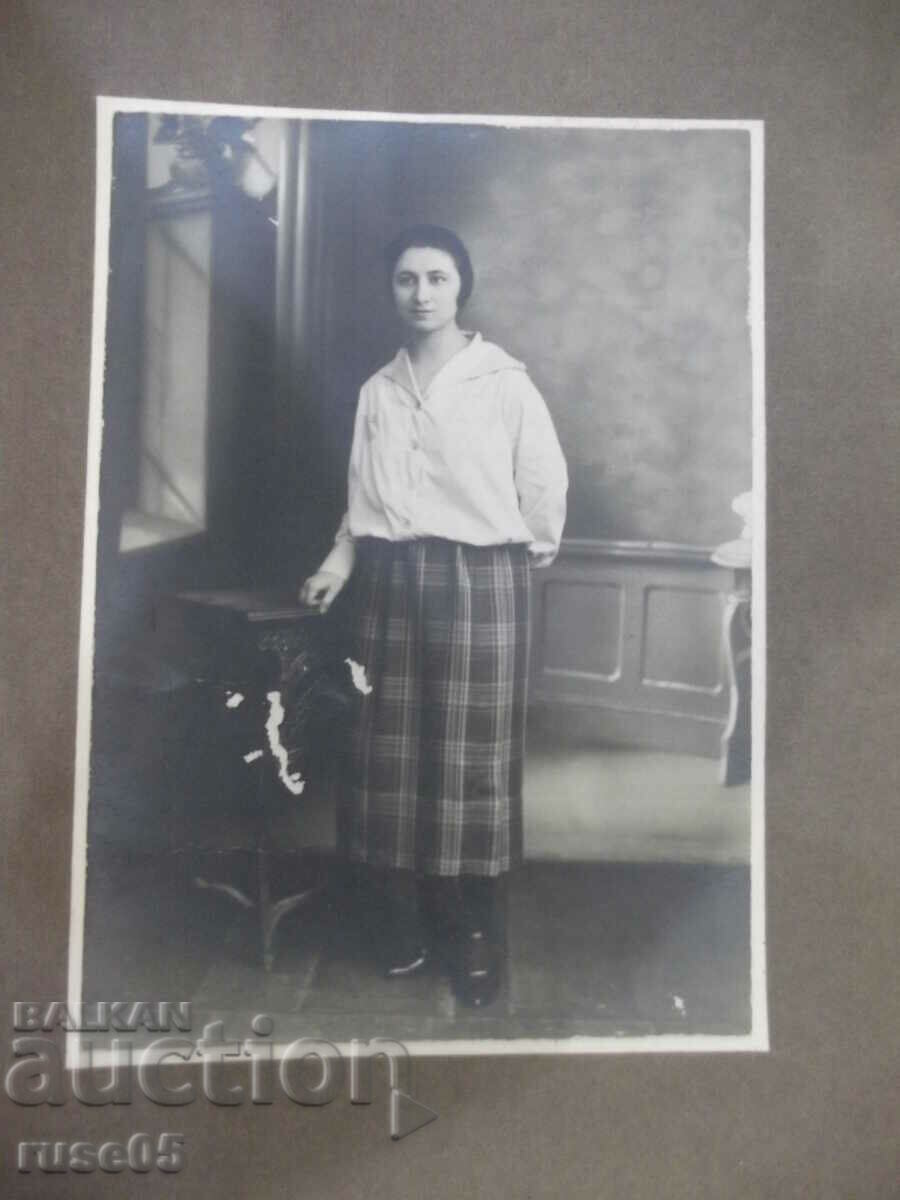 Photo old cardboard portrait of a woman next to a table with price 10.00 BGN | € 5.11 Photo old cardboard portrait of a woman next to a table with price 10.00 BGN | € 5.11