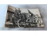 Photo Officers and soldiers next to two cannons P S V