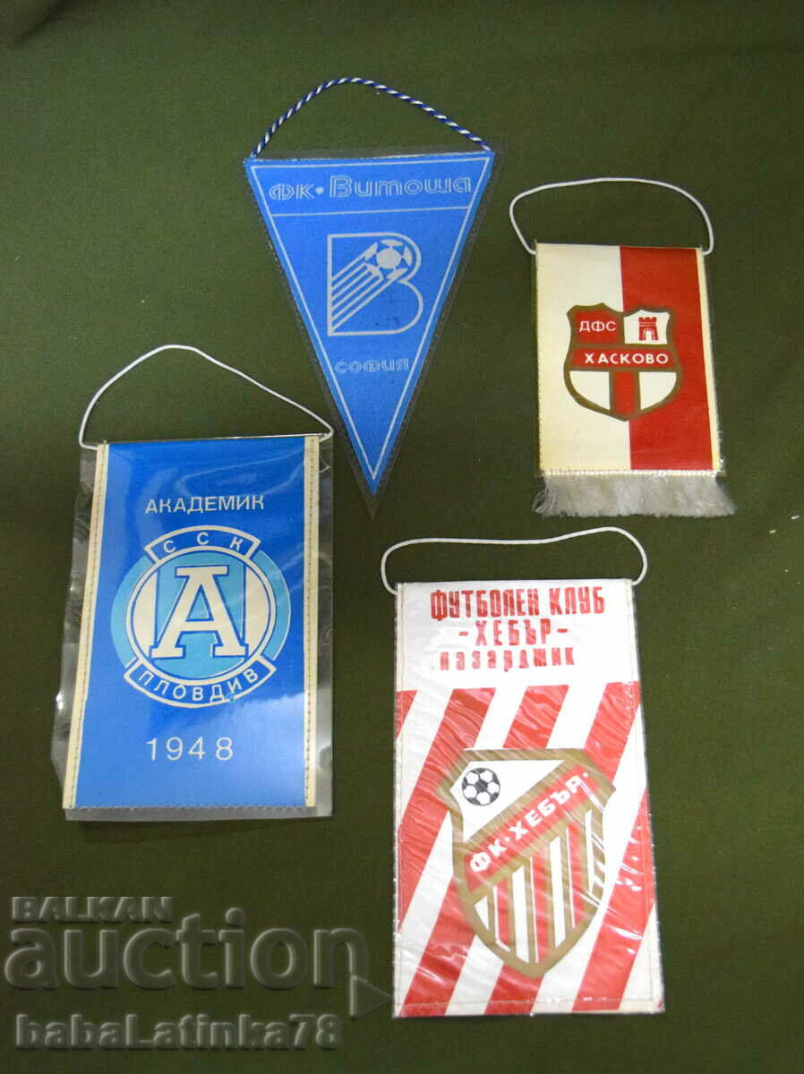 Lot of four old football flags