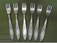 Set of six small silver-plated forks