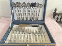 A beautiful set of cutlery with gilding and marking