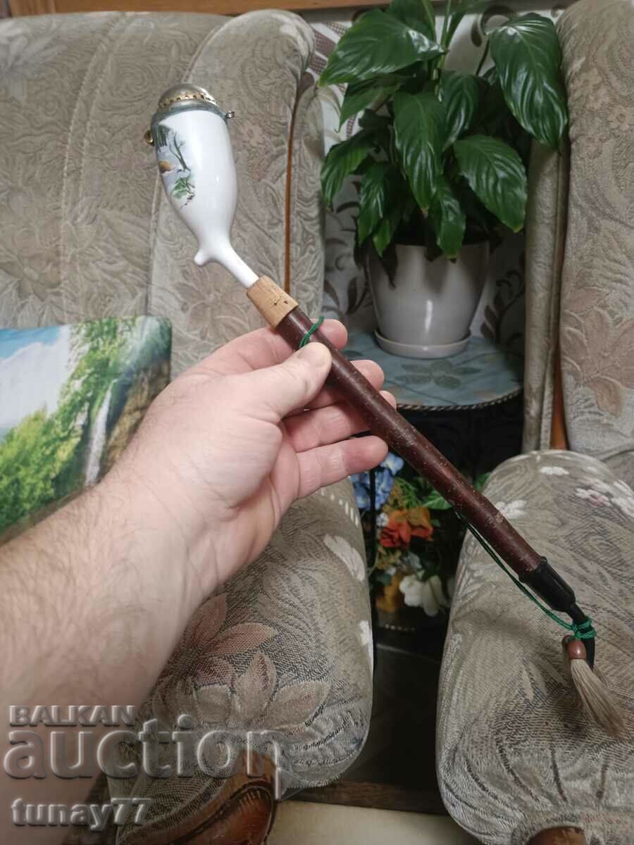 Vintage German smoking pipe with ceramic bowl