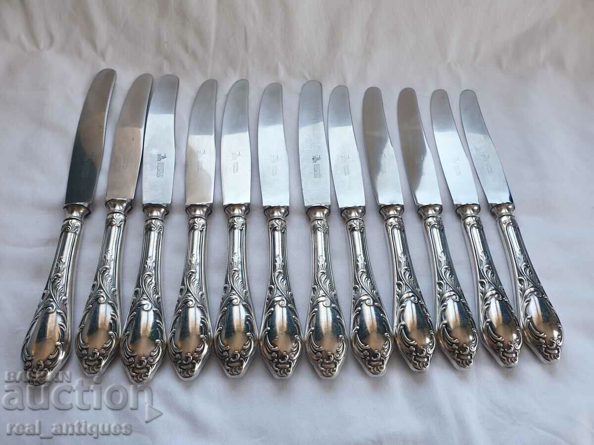 Set of silver plated knives