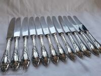 Set of silver plated knives