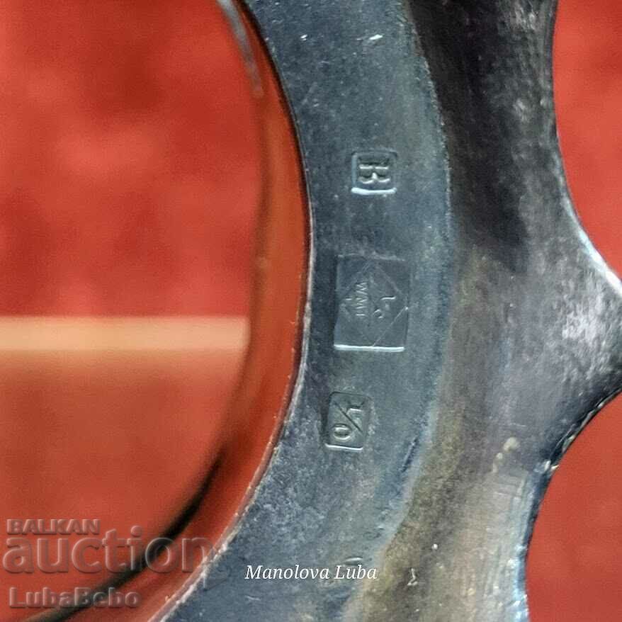 Delivery of A pair of WMF Art Nouveau cup holders. Delivery of A pair of WMF Art Nouveau cup holders.