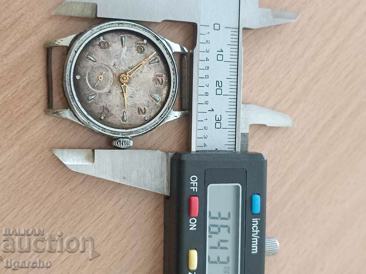 Παράδοση Κίνηση ανδρικού ρολογιού Παράδοση Κίνηση ανδρικού ρολογιού