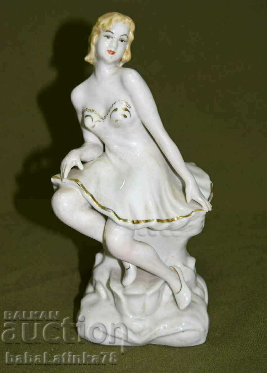 Antique porcelain figurine