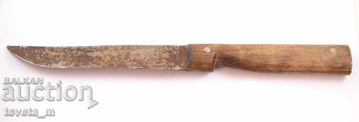 Antique knife with a wooden handle