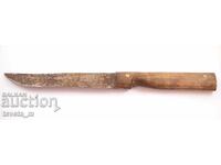 Antique knife with a wooden handle