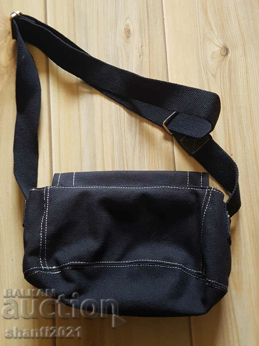 Delivery of New Saturn metal logo handbag