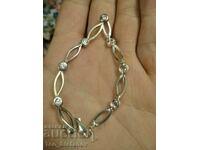 Beautiful silver bracelet with zircon markings