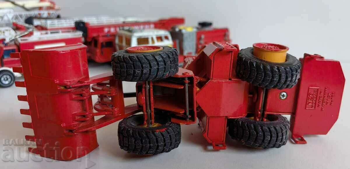 . CATERPILLAR EXCAVATOR LARGE FIRE TRUCK IRON UNUSED - 5 . CATERPILLAR EXCAVATOR LARGE FIRE TRUCK IRON UNUSED - 5