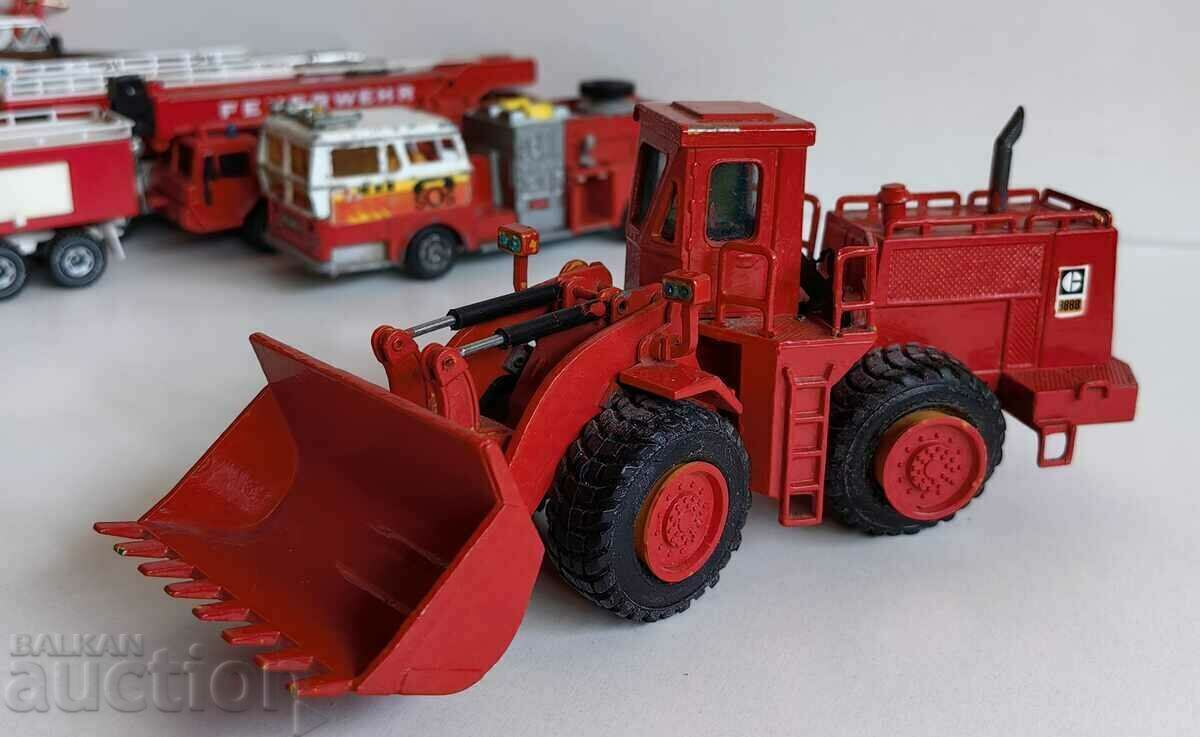 . CATERPILLAR EXCAVATOR LARGE FIRE TRUCK IRON UNUSED . CATERPILLAR EXCAVATOR LARGE FIRE TRUCK IRON UNUSED