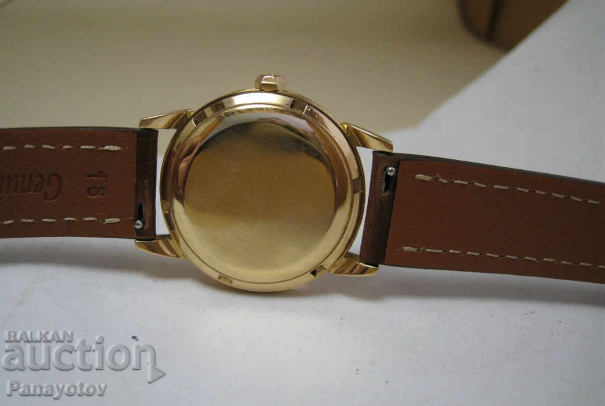 Auction  OMEGA GOLDEN GOLD WATCH 18K 1953 YEAR IDEAL HAND