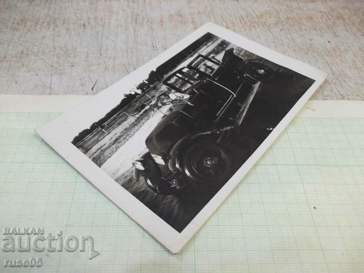 Auction Old photo of a young gentleman in a car Auction Old photo of a young gentleman in a car